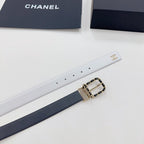 Leather belt laid flat with white strap and gold-tone CC buckle with chain detail