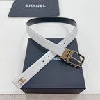 Leather belt with dark blue strap and gold-tone CC buckle with chain link detail