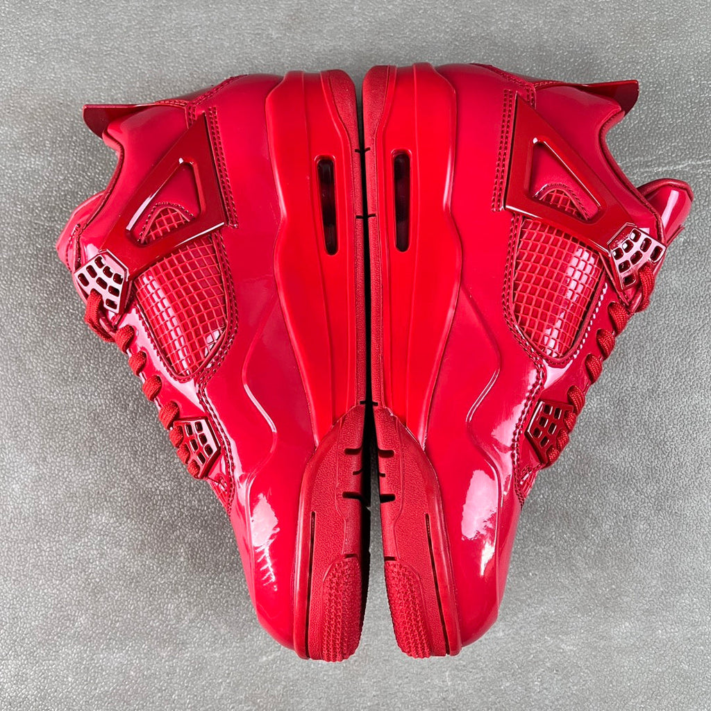 Red patent Jordan sneakers top view showing front laces and side panels