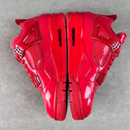 Red patent Jordan sneakers top view showing front laces and side panels