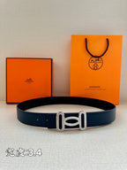 Hermes leather belt in dark blue with silver-tone H buckle and punched holes