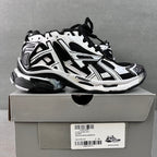 Balenciaga unisex sneakers in white and black, lace-up, shown on box