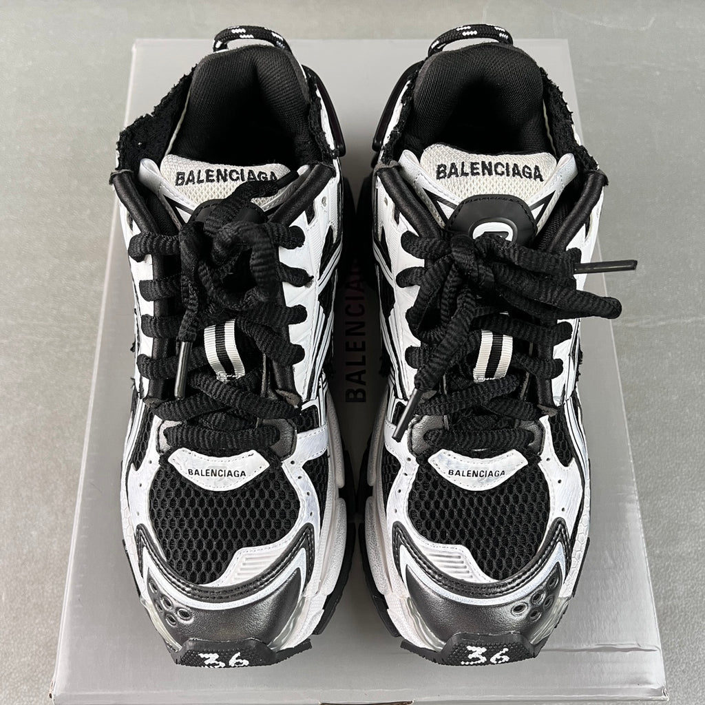 Balenciaga unisex sneakers, rear view with BALENCIAGA heel tabs and black laces