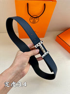 Hermes leather belt with dark blue strap and metallic studded square buckle