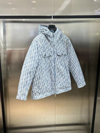 Blue and white patterned hooded long jacket on hanger, full-length sleeves, zip front