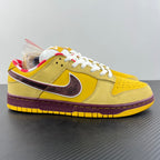 Yellow low-top sneaker with white laces, maroon swoosh, and gum sole.