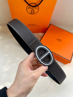 Hermes belt with dark leather strap and silver-toned double H buckle