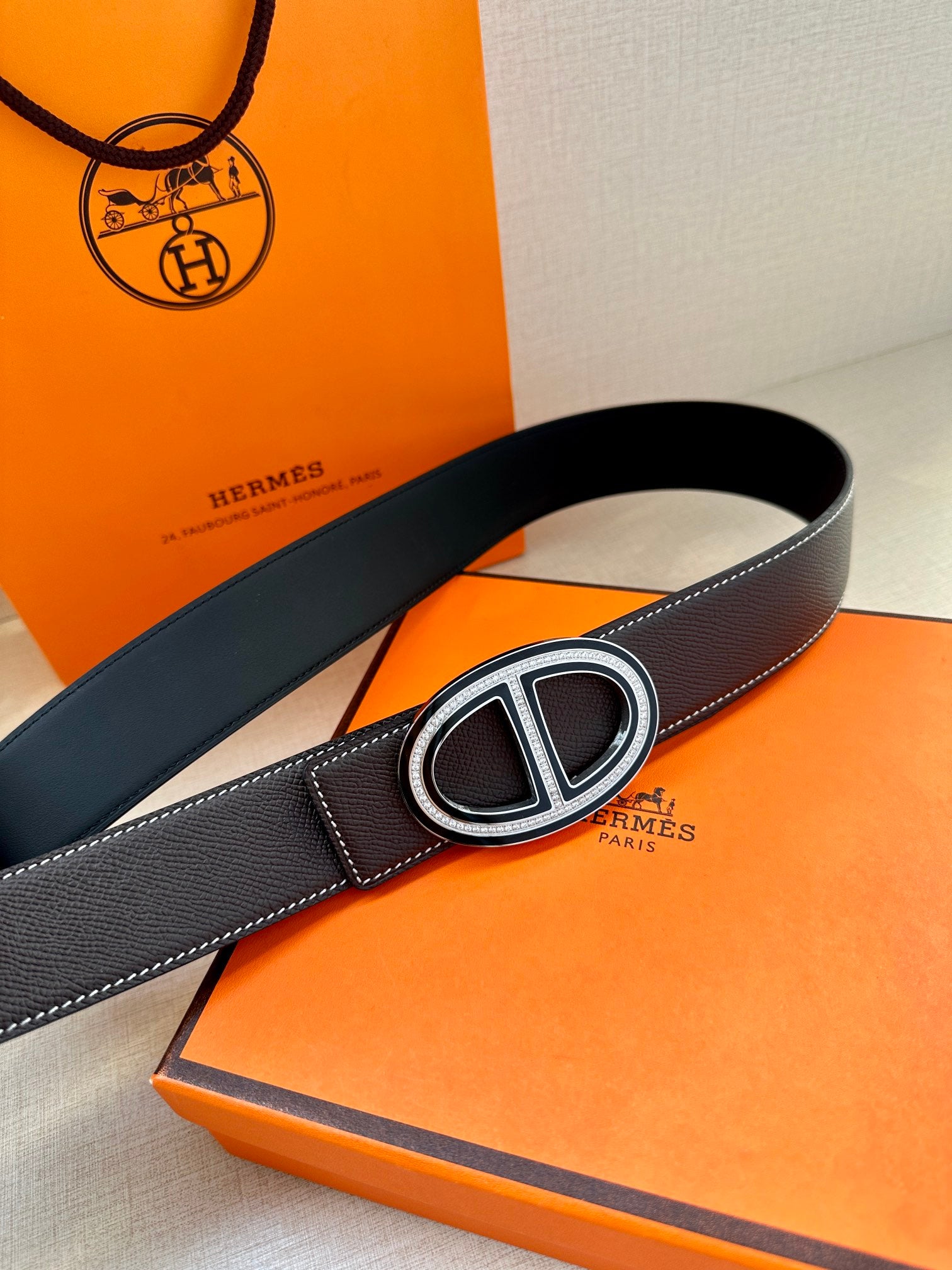 Hermes belt, dark leather with double H buckle and contrast white edge stitching