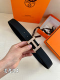 Dark textured Hermes belt with silver studded H buckle
