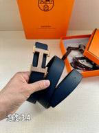 Leather belt, dark blue with silver-tone H buckle and folded strap
