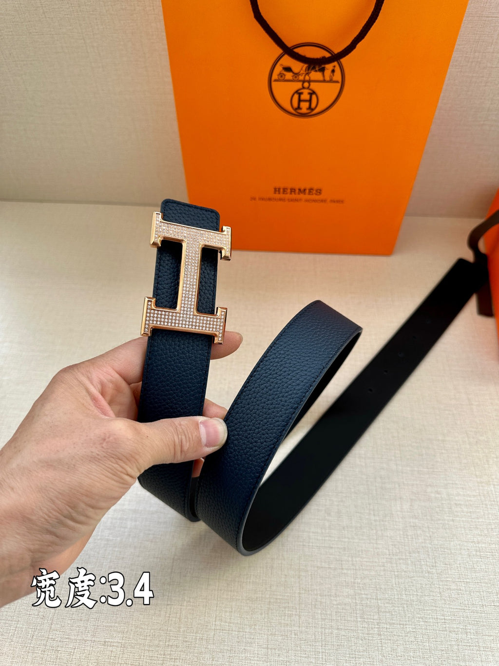 Leather belt, dark blue, silver-tone H buckle detail with looped straps