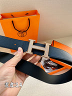 Leather belt, dark blue, wide with silver-tone H buckle and adjustable holes