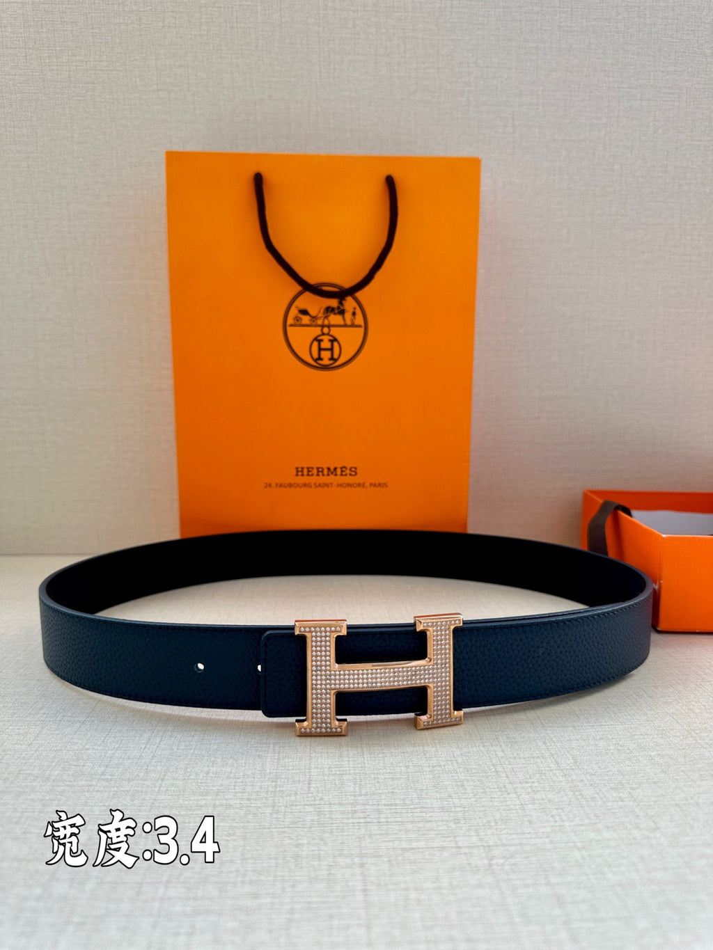 Leather belt, dark blue with silver-tone H buckle and continuous strap