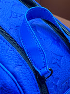Blue embossed Louis Vuitton zip pouch bag strap with black zipper along the edge