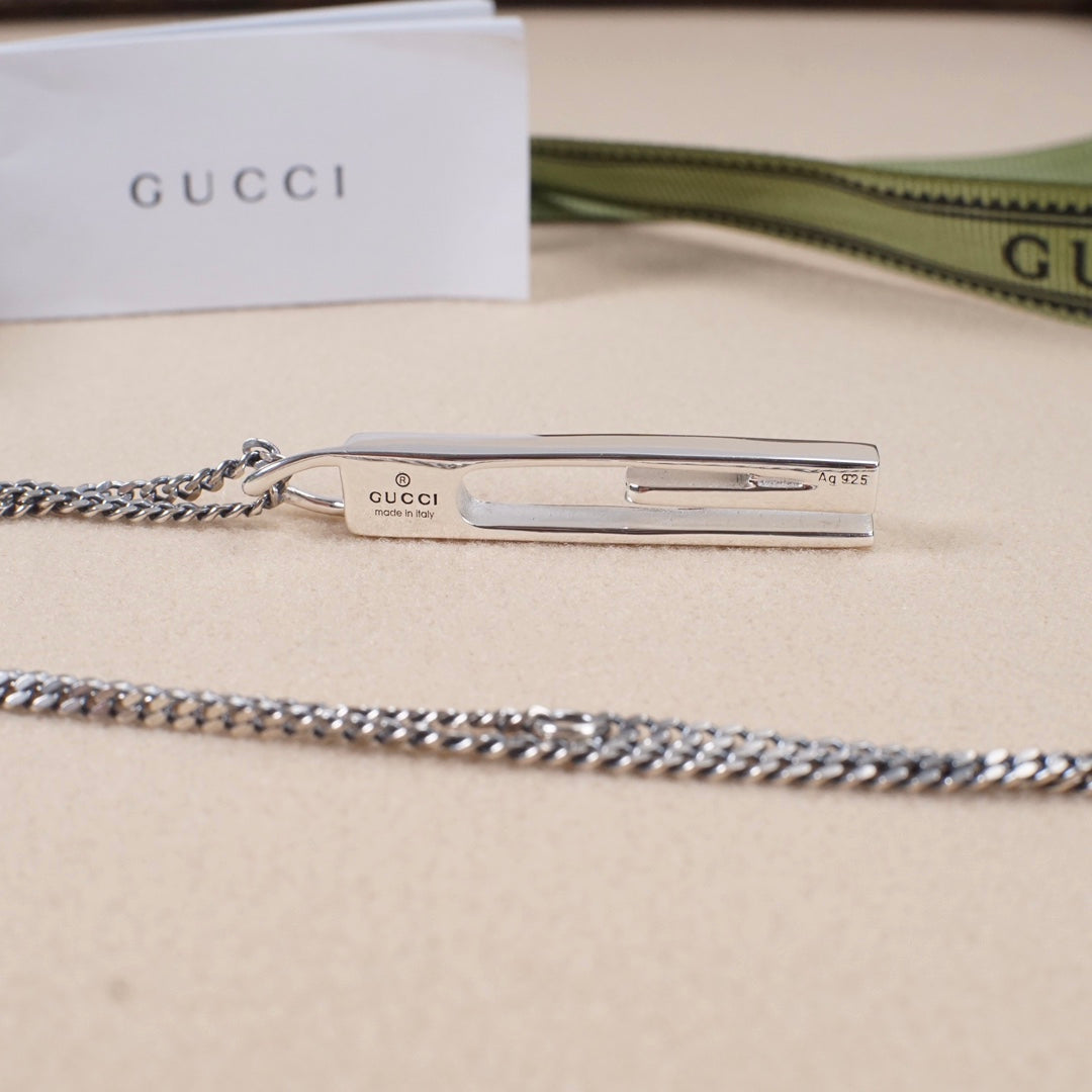 Gucci necklace pendant and chain with silver-tone bar and logo
