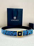Versace logo belt with blue webbing, gold buckle and Medusa emblem.