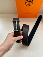 Hermes belt, dark leather strap with silver-tone double-bar buckle