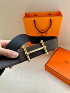 Hermes belt, dark leather strap with gold-tone rectangular buckle
