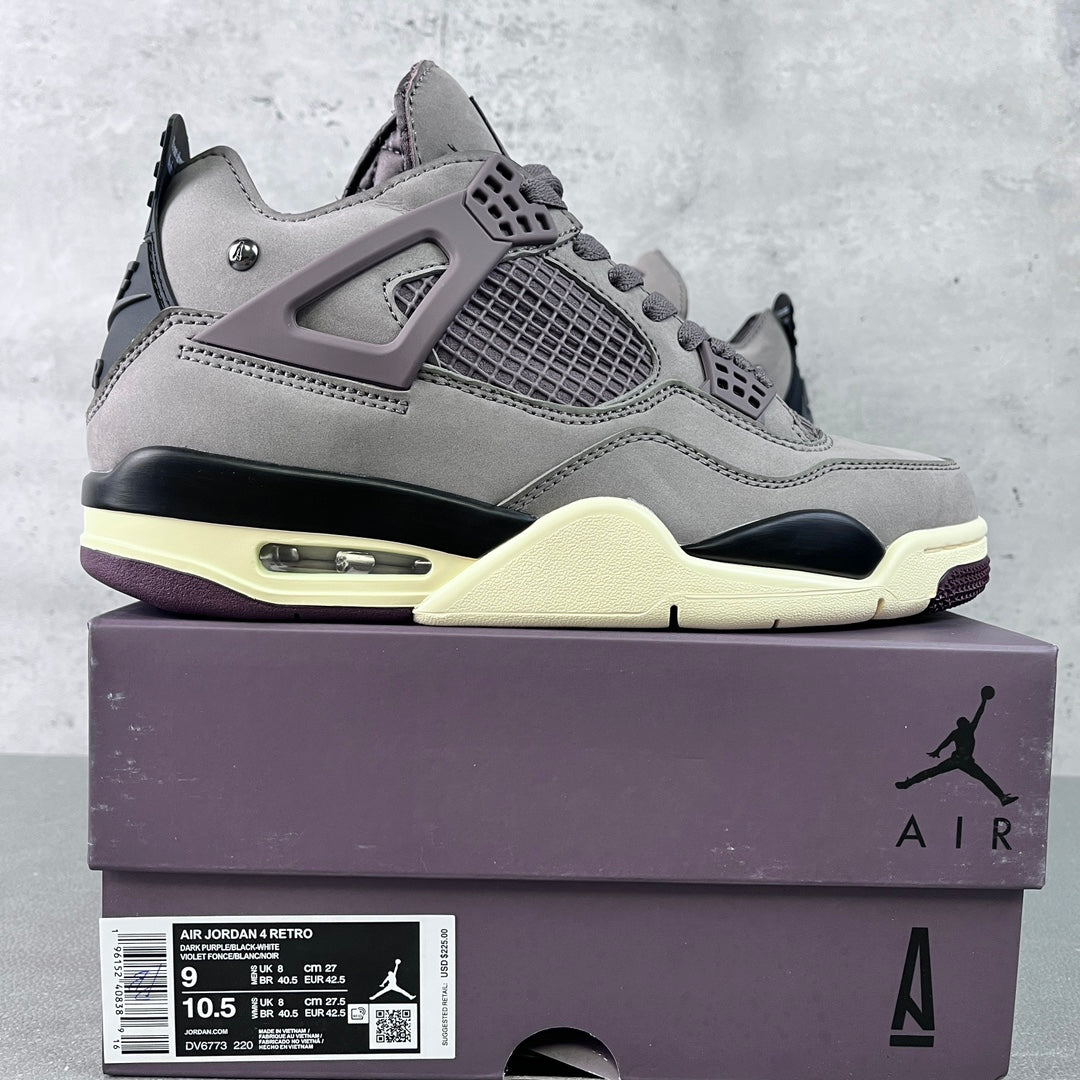 Grey suede Air Jordan 4 sneaker with black outsole and light yellow midsole