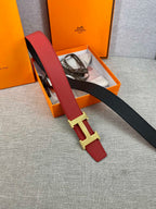 Red leather belt with gold H buckle and black end strap