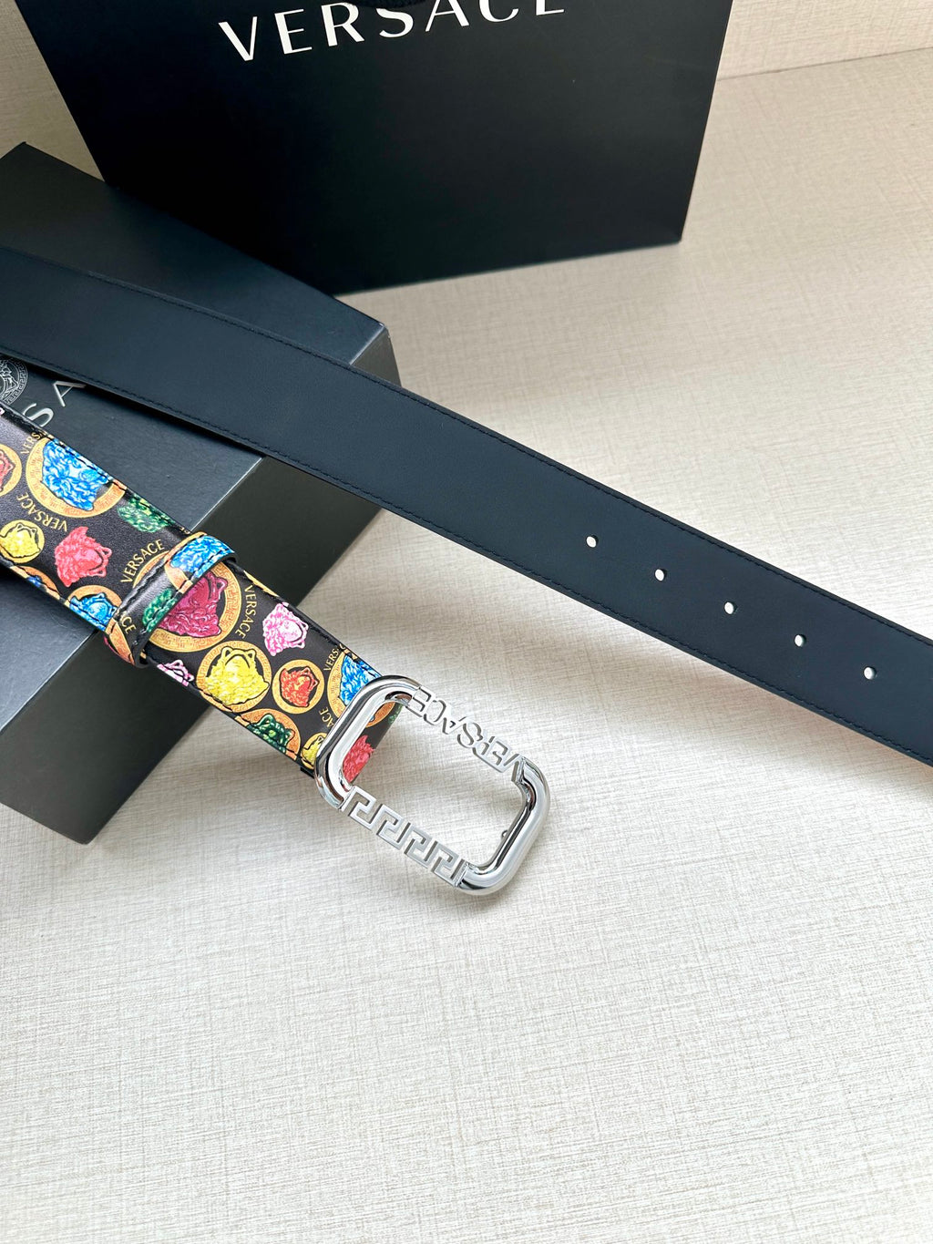 Versace belt strap detail with multicolor print and square buckle with silver-tone finish
