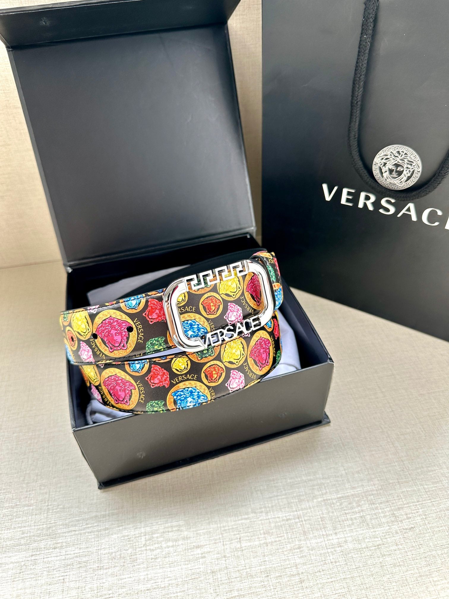 Versace belt folded in box, multicolor medallion print with silver-tone buckle accents