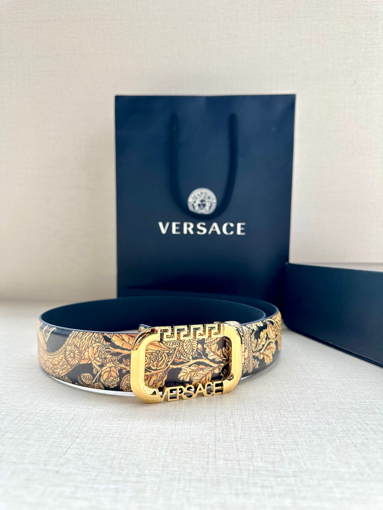 Versace belt with gold-toned baroque print strap and gold-tone buckle