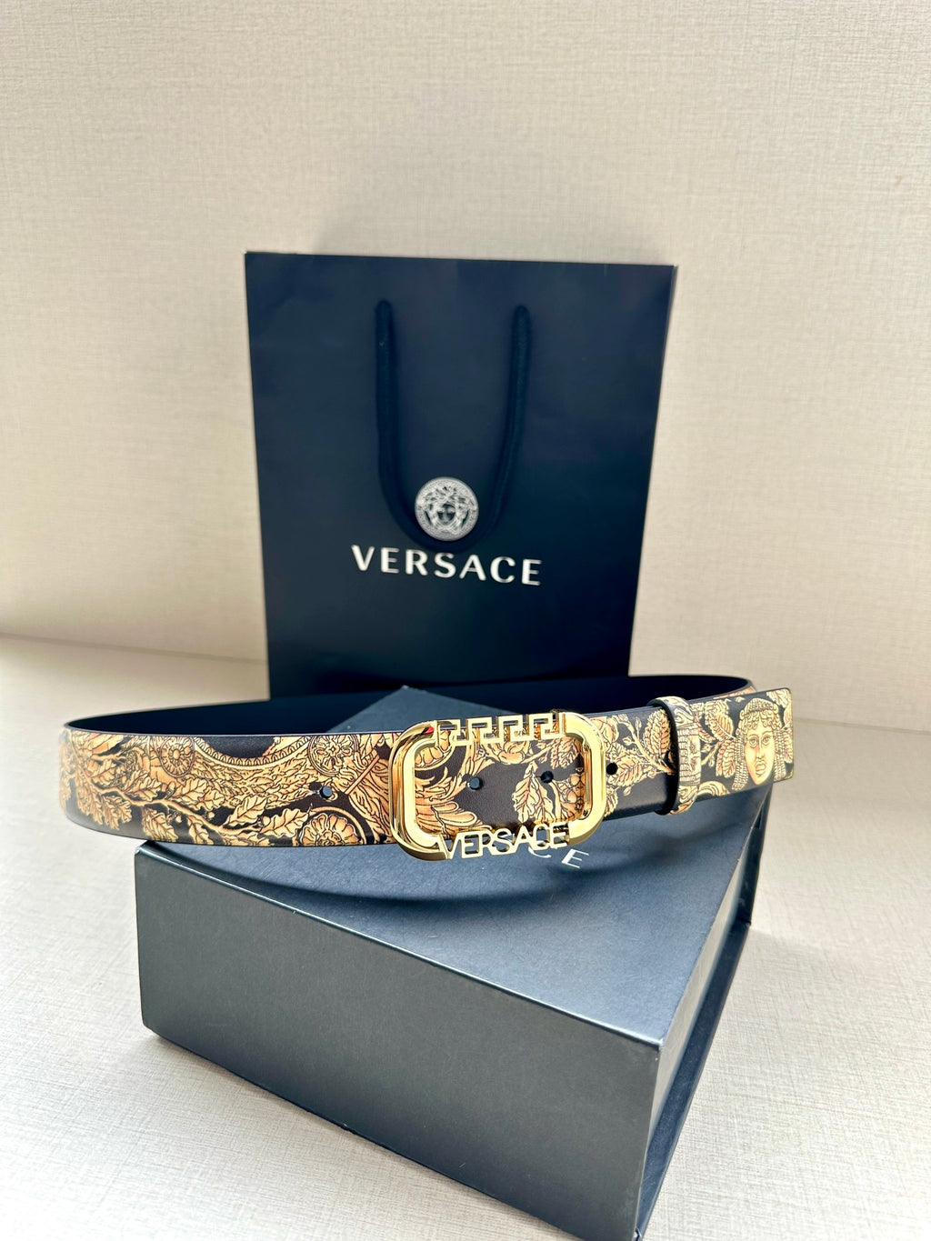 Versace belt with gold baroque print strap and gold-toned buckle