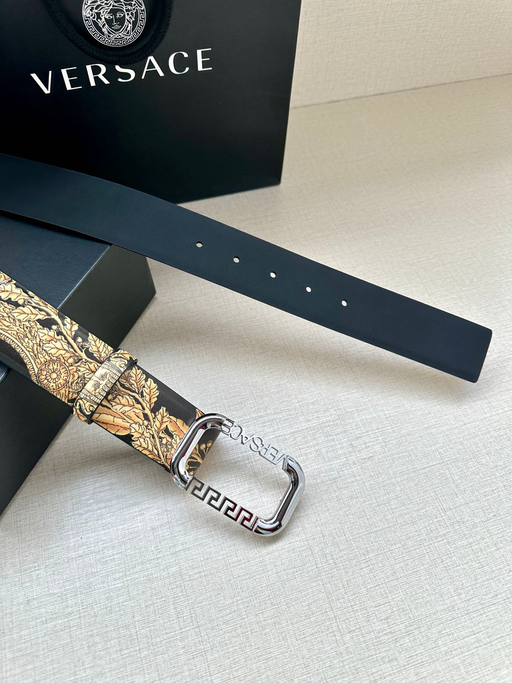 Versace belt on dark band with gold baroque strap and silver buckle