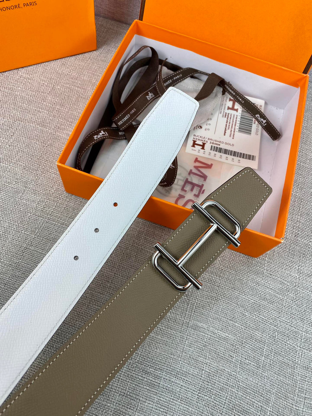 Hermes belt set: olive and white straps with gold-tone buckle