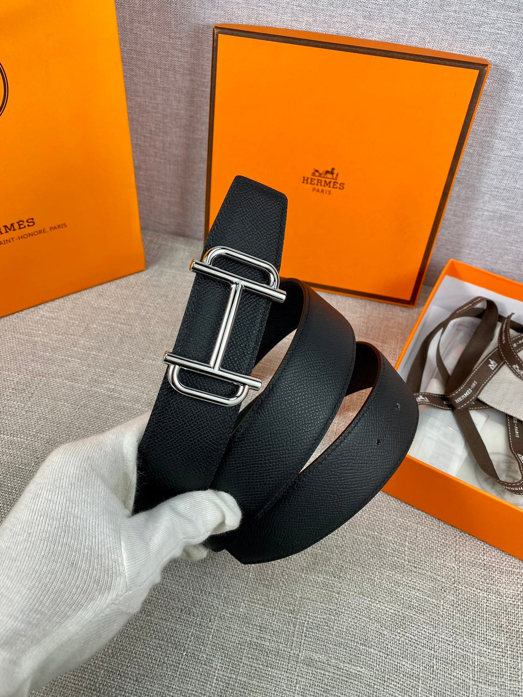 Hermes belt with dark textured leather and silver double-prong buckle