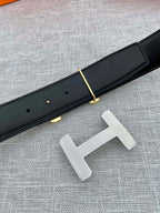 Hermes belt dark leather with gold-tone prong and silver-tone H buckle