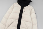 Long puffer jacket with hood, cream quilted panels, black placket and button front.