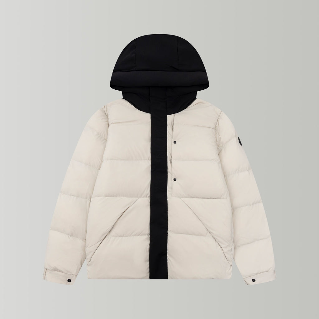 Long puffer jacket with hood, cream body and black front placket and hood lining.