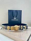 Versace patterned belt with gold Medusa buckle and dark blue leather strap.