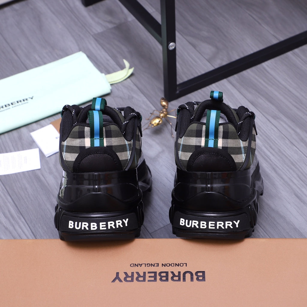 Burberry chunky sneakers, back view with BURBERRY lettering and teal lace accents