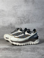 Moncler trail sneaker, front 3/4 view, white leather-look with navy and black details