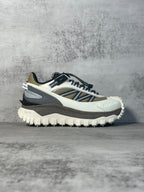 Moncler trail sneaker in white, navy and black with rugged tread outsole