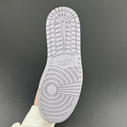 Shoe outsole with tread and circular traction pattern on underside.