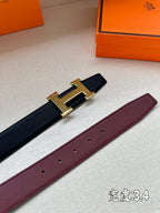 Leather belt with gold-tone H buckle; dark and burgundy straps shown