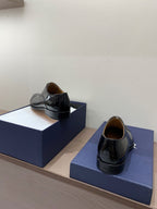 Dior unisex lace-up Oxford shoes in black patent leather, rear view