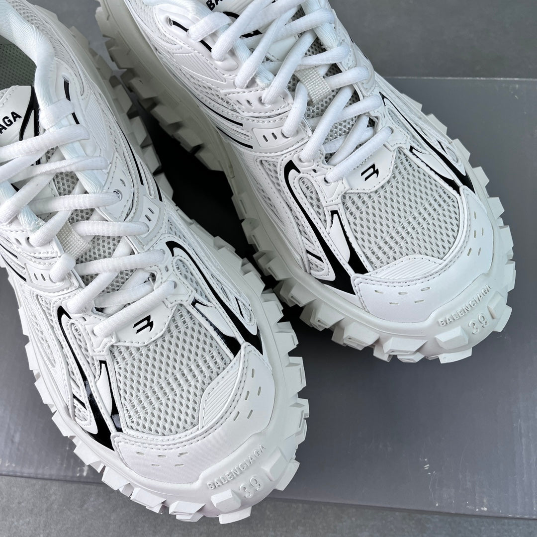 Balenciaga unisex white sneakers paired view with black side logos