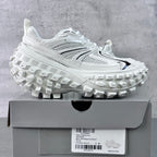 Balenciaga unisex white sneaker on box with oversized tread outsole