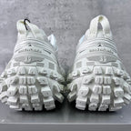 Balenciaga unisex white sneaker soles view with BALENCIAGA text on heel