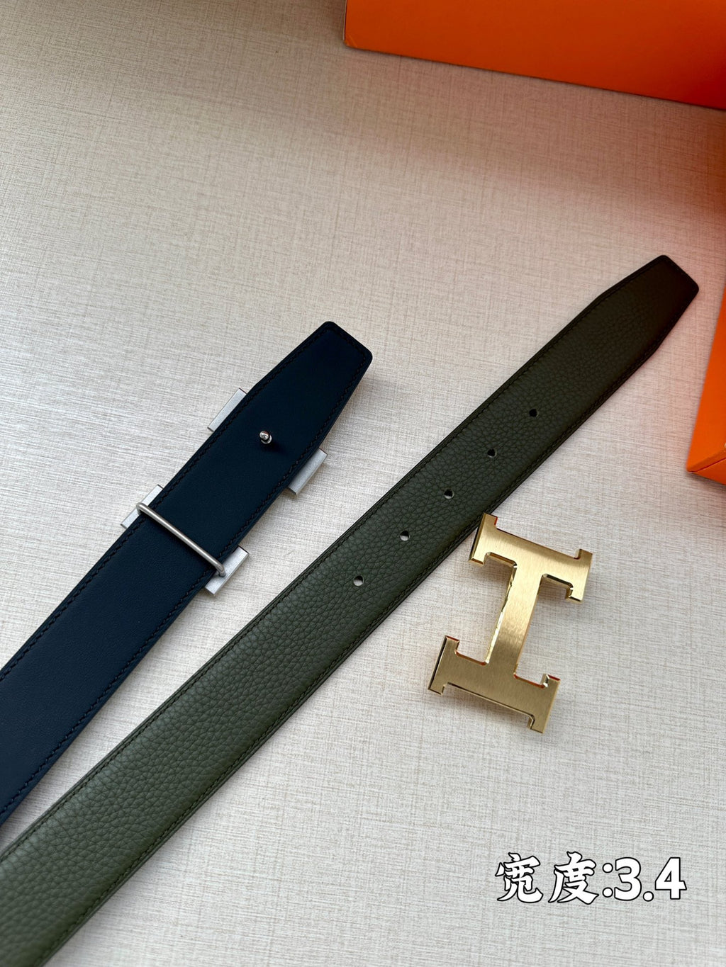 Leather belts set: navy and green, each with gold-tone H buckle