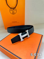 Hermes belt in dark blue leather with gold-tone H buckle and keeper