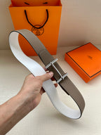 Taupe and white leather belt with silver-tone double-prong buckle