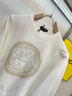 Versace white sweatshirt with gold Medusa face rhinestone-style print