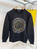 Black crewneck sweatshirt with multicolor rhinestone Medusa medallion