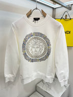 White crewneck sweatshirt with rhinestone Medusa medallion graphic